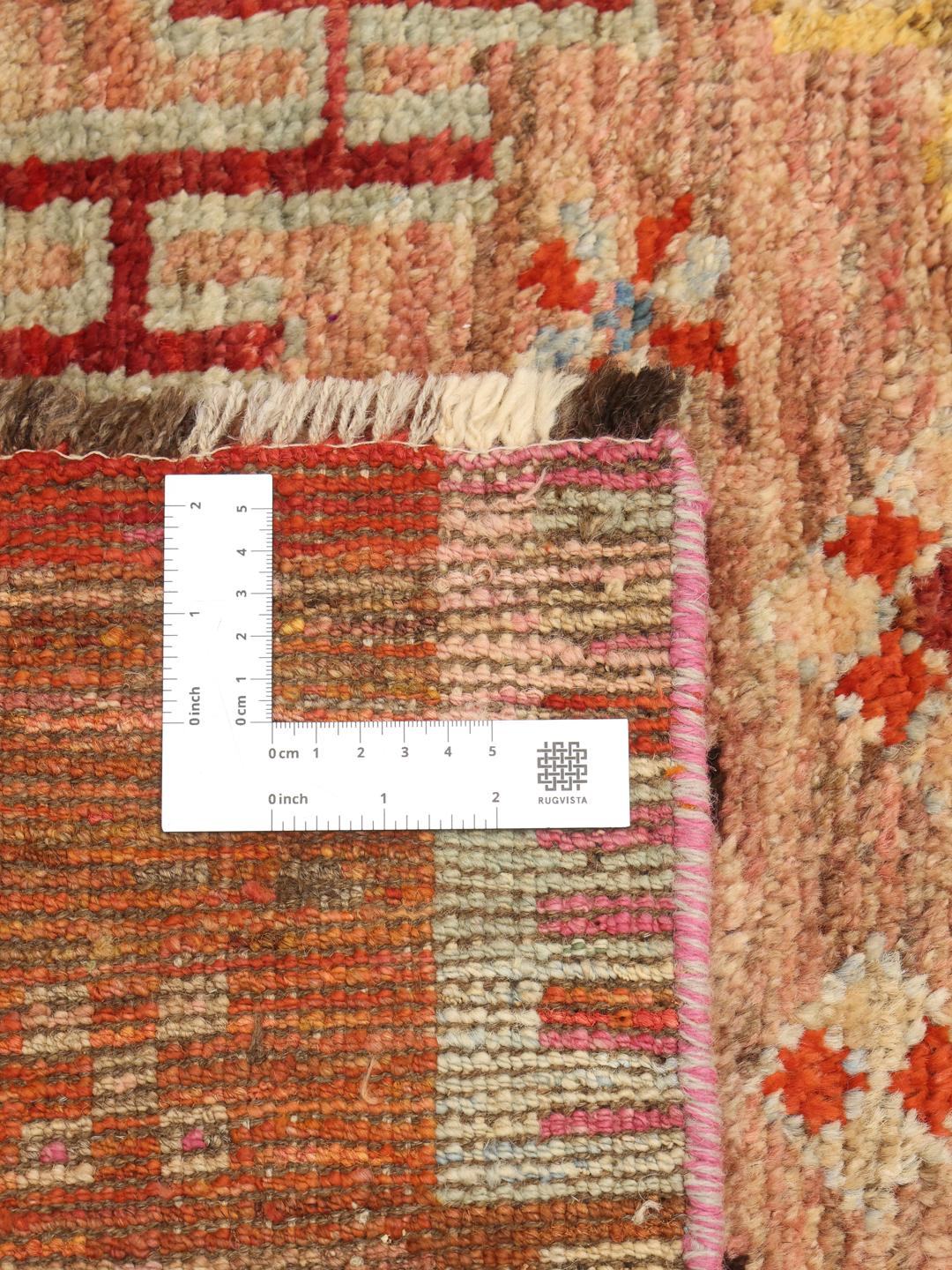 Hand-knotted Berber rug from Afghanistan in multicolor tones with tribal geometric patterns