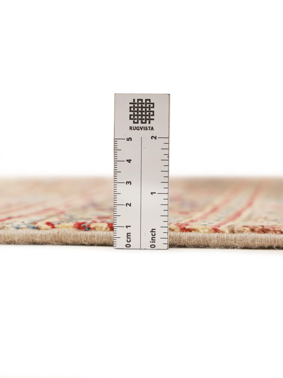 Hand-knotted brown runner rug from Afghanistan with geometric tribal patterns.