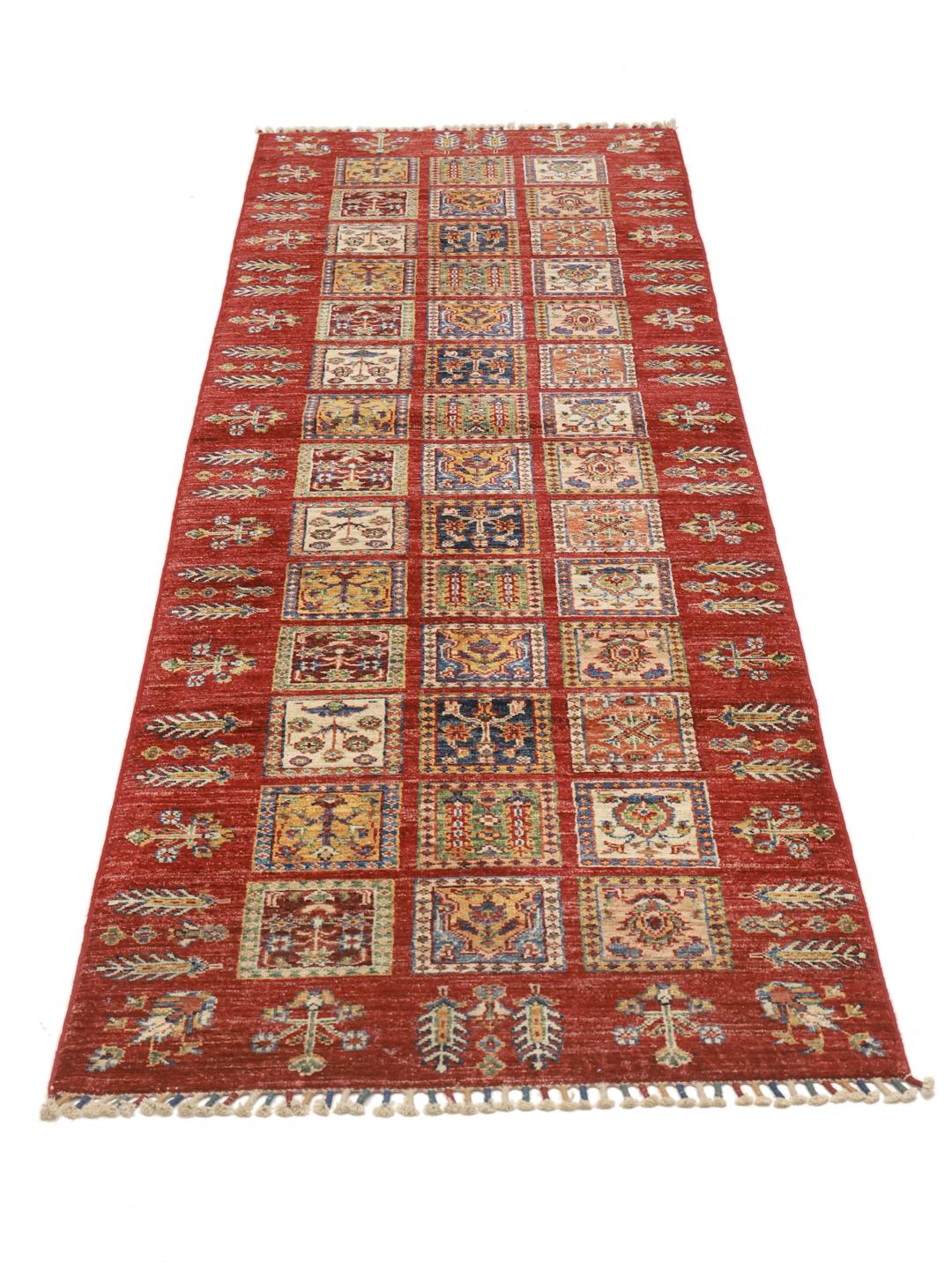 Handmade runner rug from Afghanistan in red