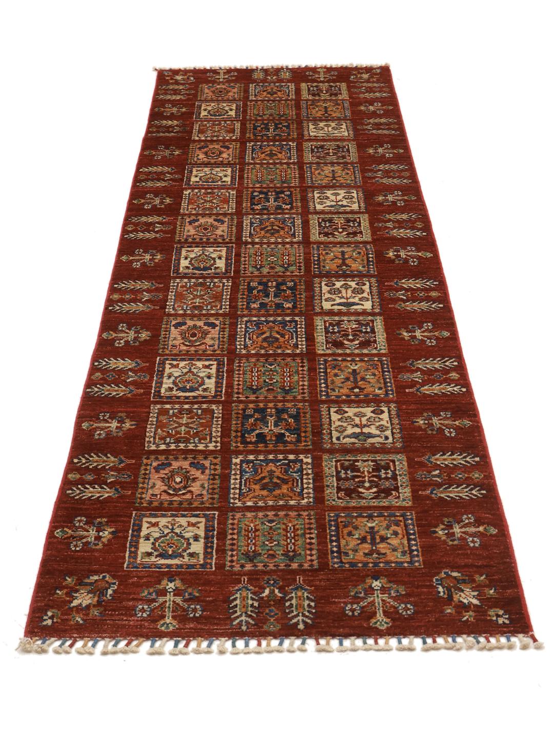Handmade runner rug from Afghanistan in red
