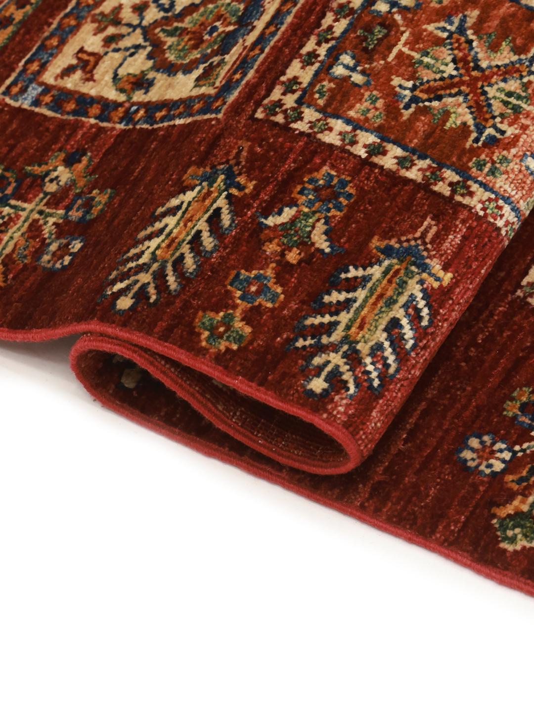 Handmade runner rug from Afghanistan in red