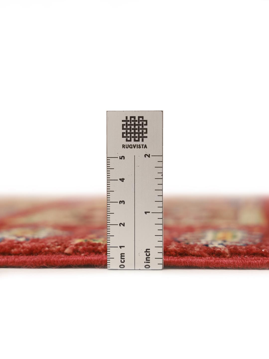 Handmade runner rug from Afghanistan in red