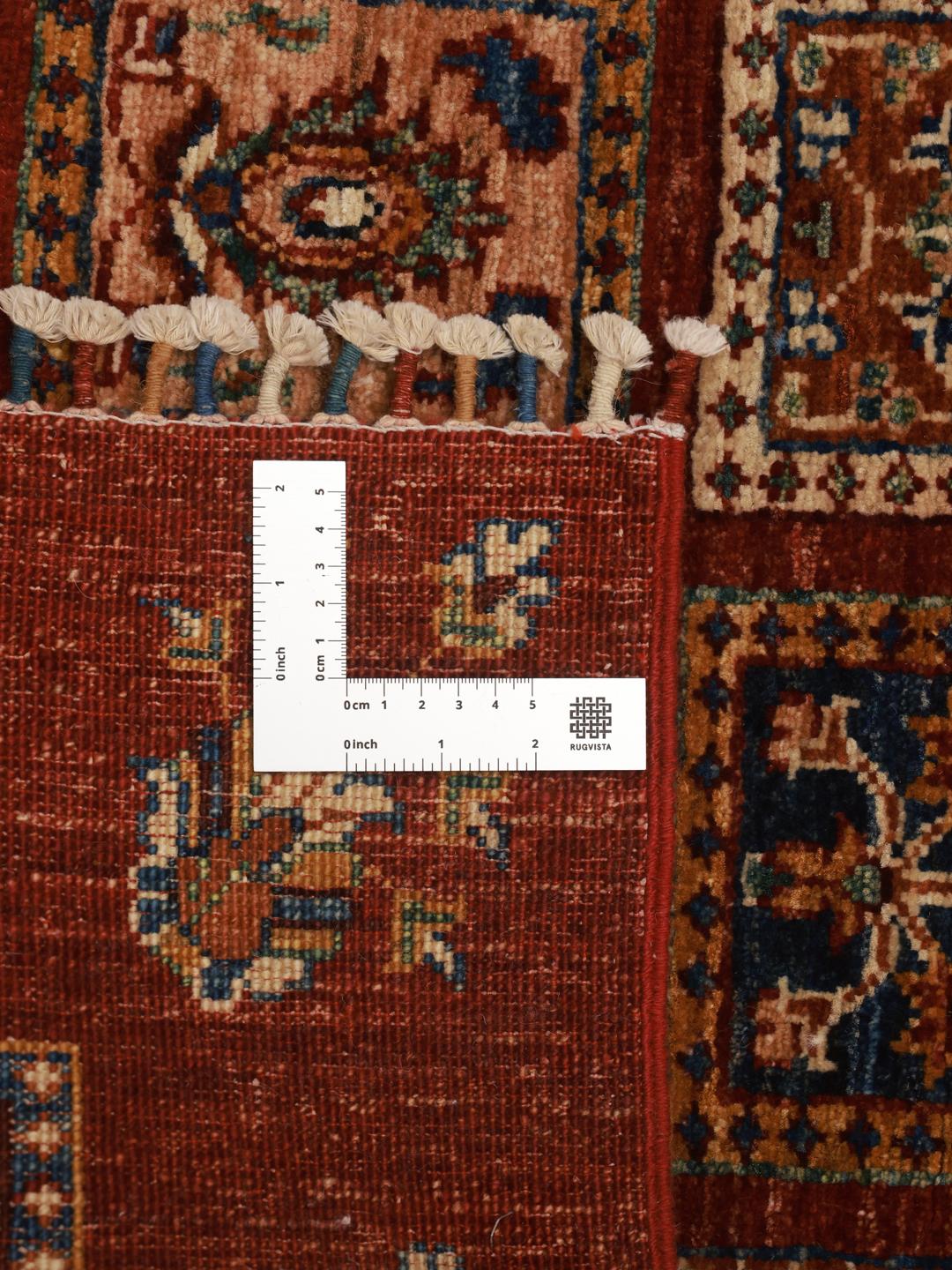 Handmade runner rug from Afghanistan in red