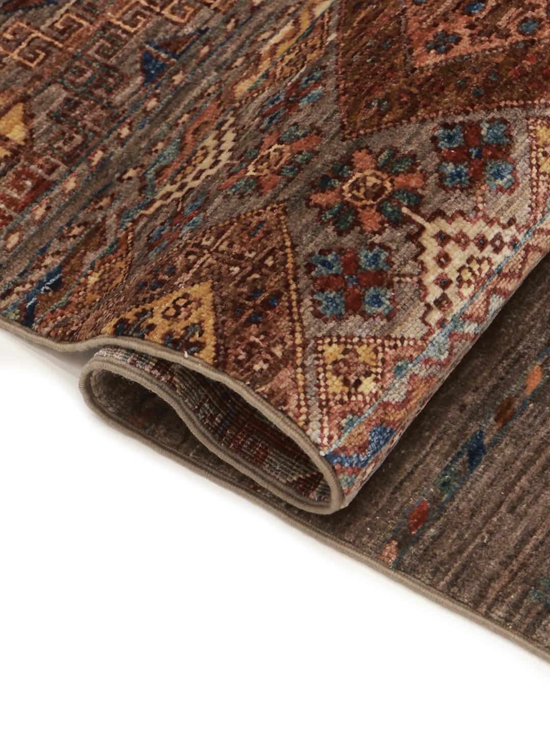 Hand-knotted Afghan runner in brown with geometric border patterns