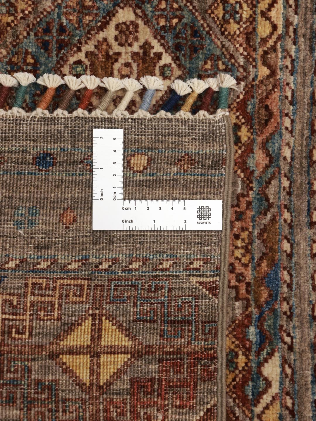 Hand-knotted Afghan runner in brown with geometric border patterns