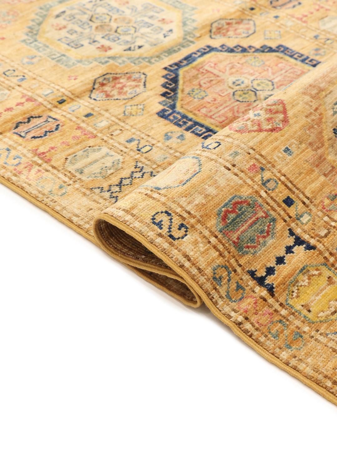 Hand-knotted Kazak Ariana runner with geometric medallions in red, blue, and gold tones from the Middle East.