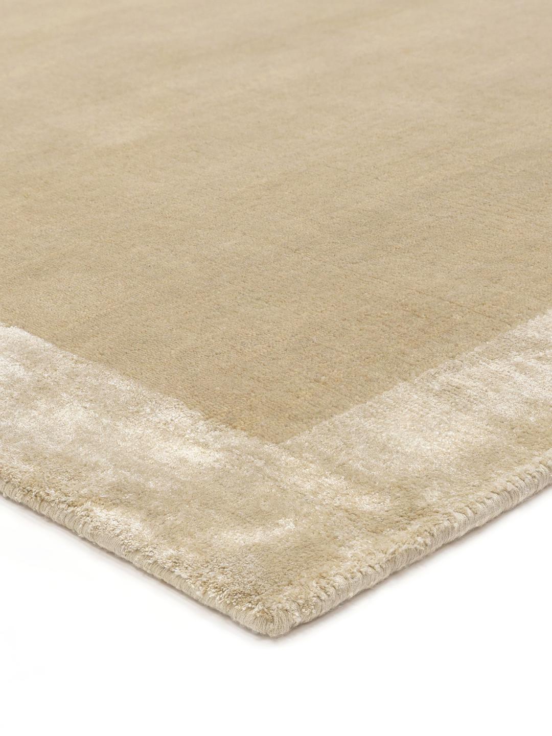 Beige tapijt met een zachte handloom textuur