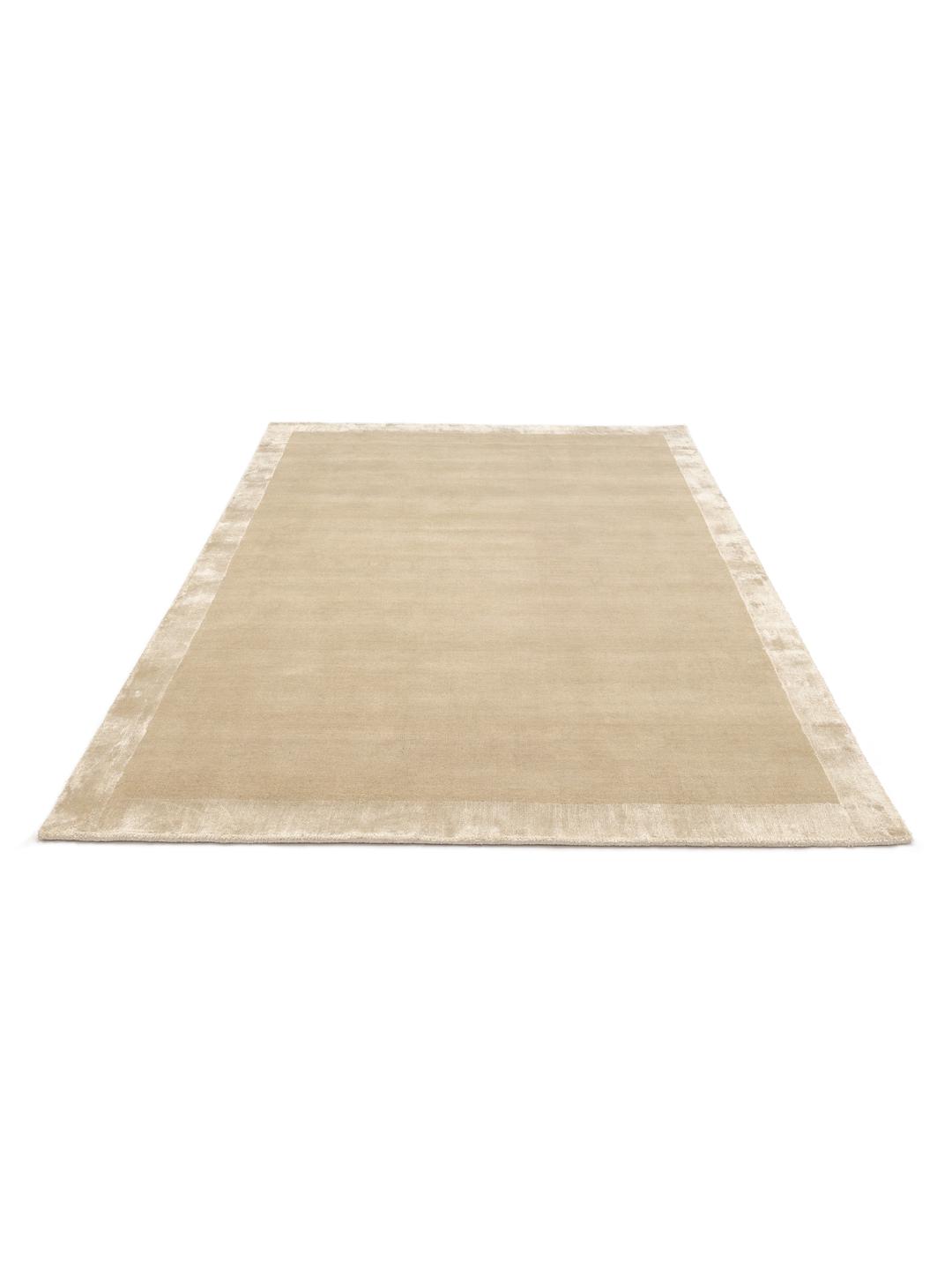 Beige tapijt met een zachte handloom textuur