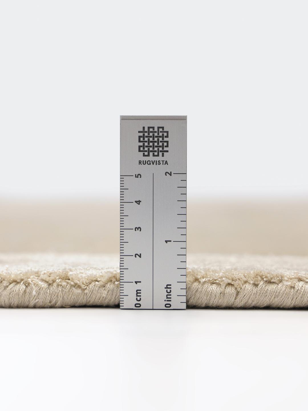 Beige tapijt met een zachte handloom textuur