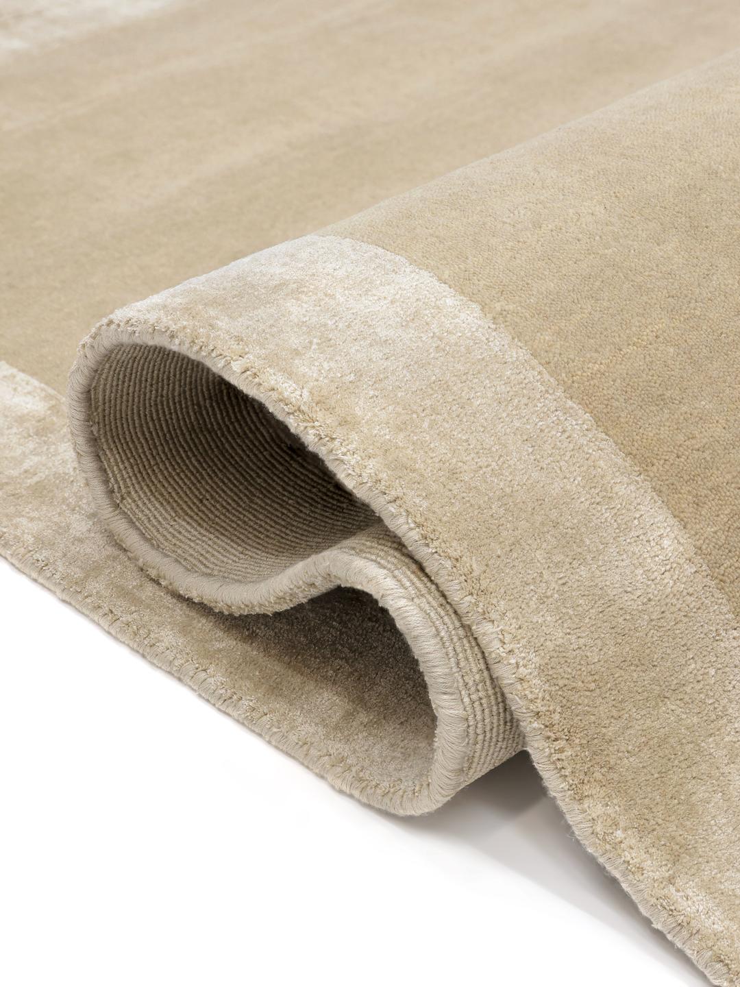 Beige tapijt met een zachte handloom textuur