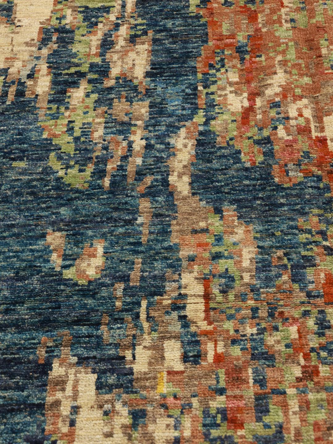 Handgeknoopt Afghaans tapijt met een kleurrijk abstract patroon in multicolor wol.