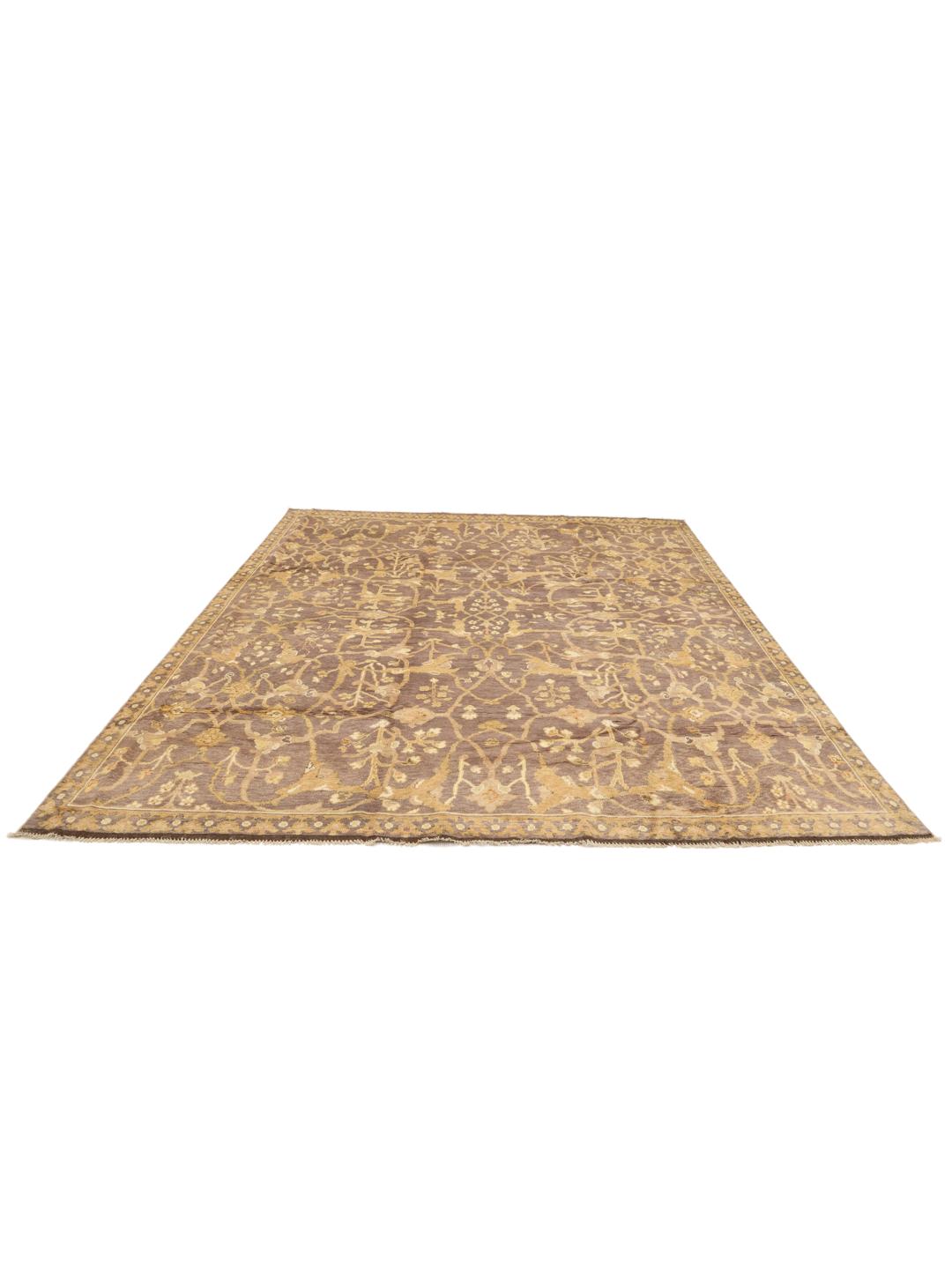 Handgeknoopt Afghaans Usak-tapijt met een bloemenpatroon in bruine en beige tinten.