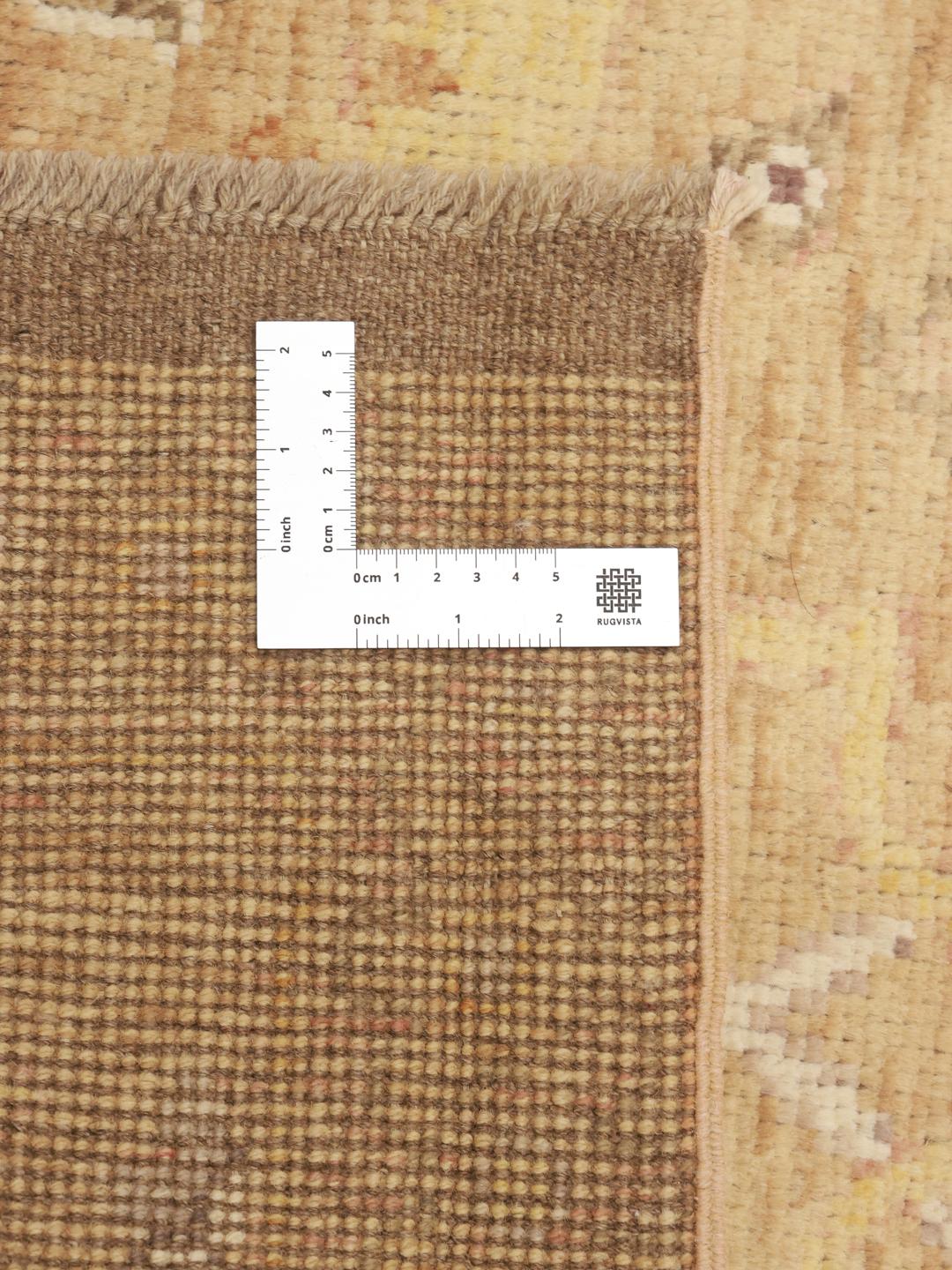 Met de hand geknoopt Usak-tapijt uit Afghanistan in warme beige tinten
