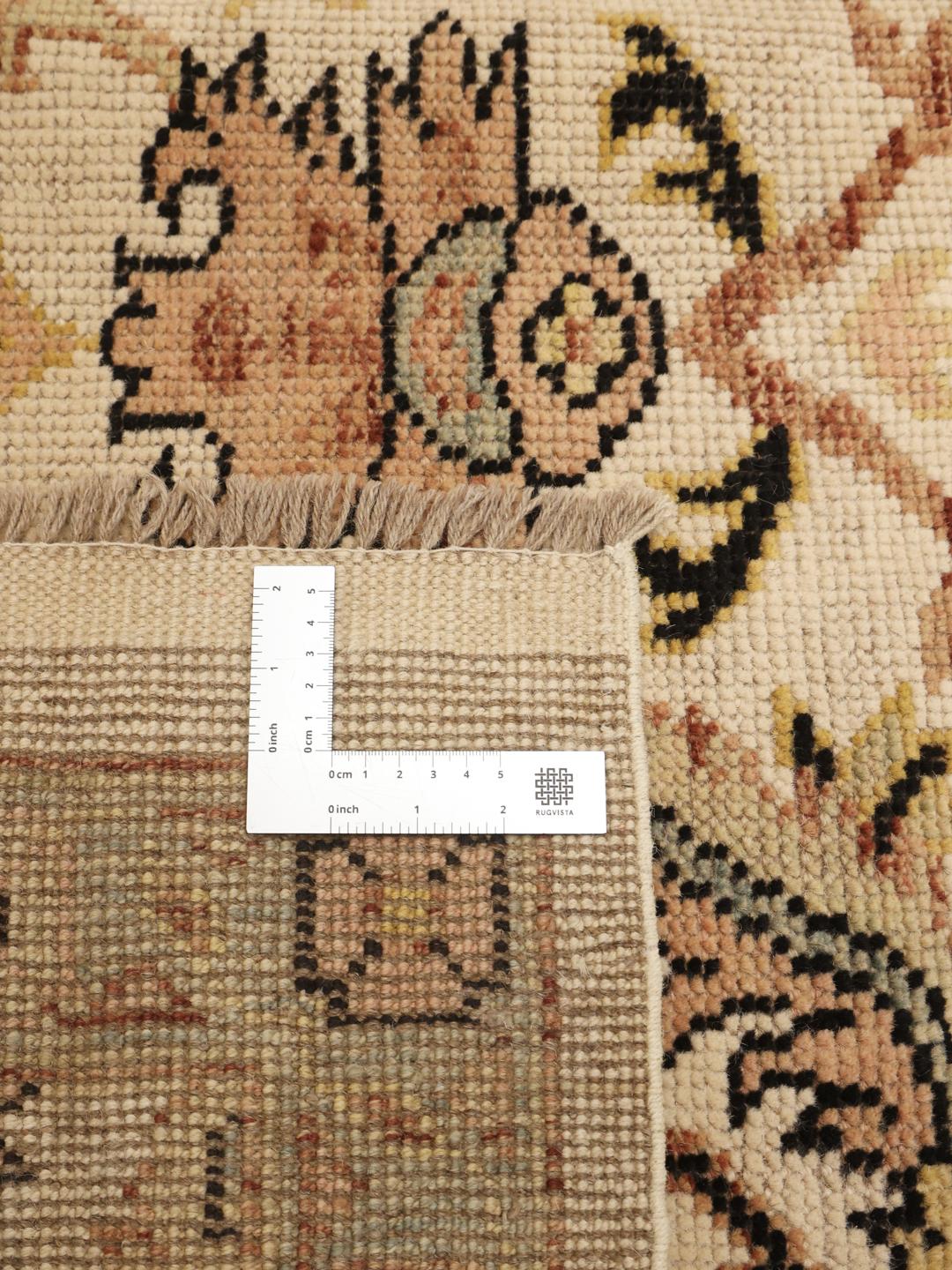 Handgeknoopt Afghaans Usak tapijt met bloemmotieven in beige en gedempte tinten
