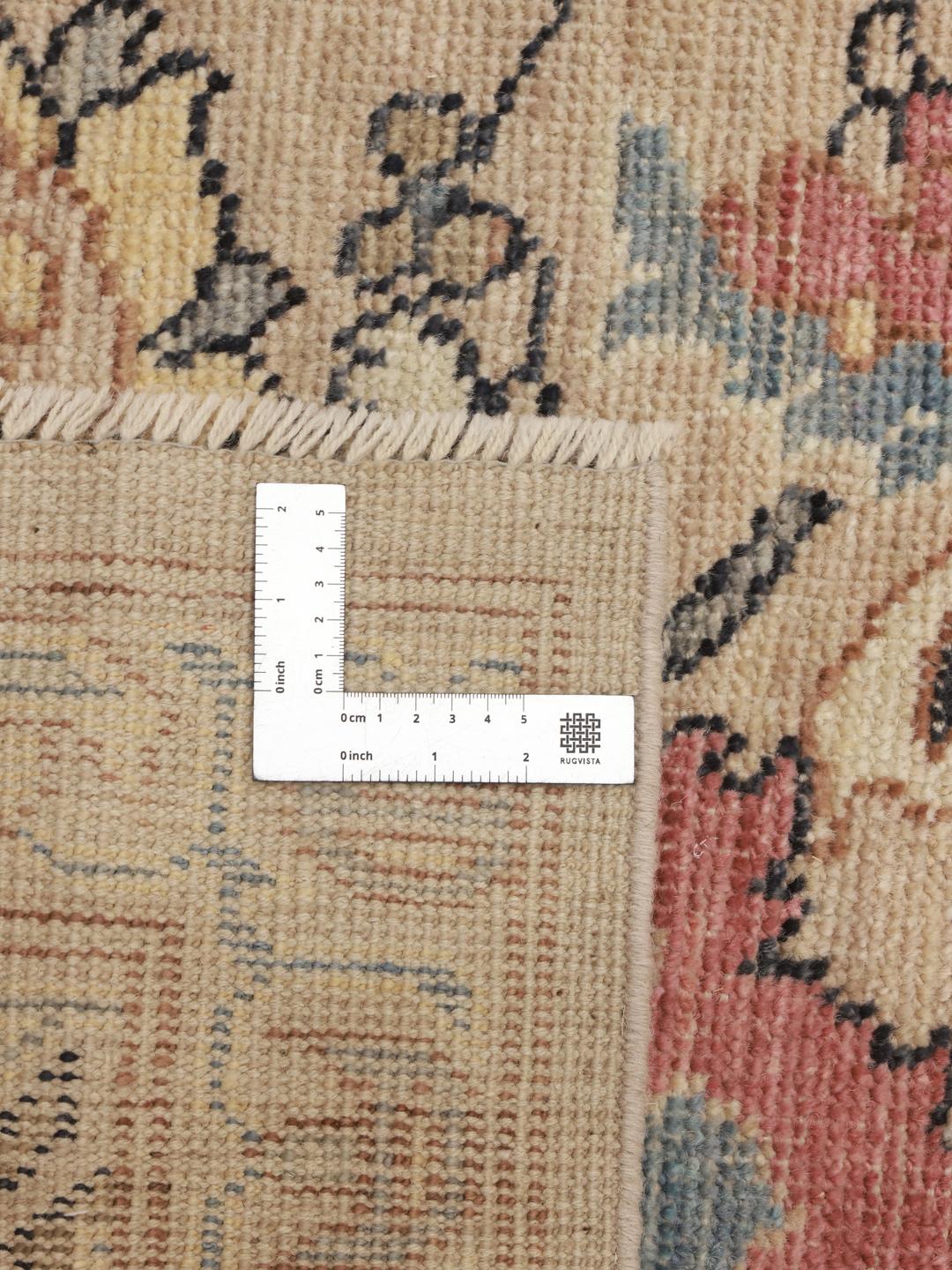 Handgeknoopt Afghaans tapijt in beige met bloemmotieven