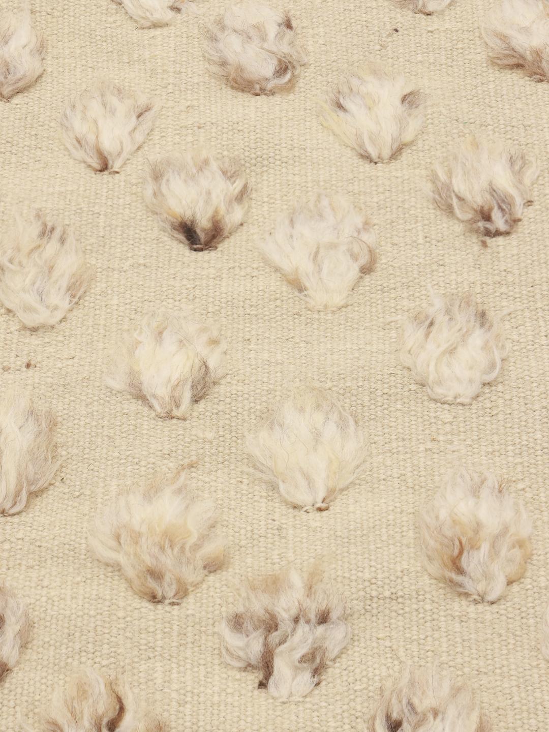 Hand-knotted Berber Style rug from the Middle East in a neutral beige tone