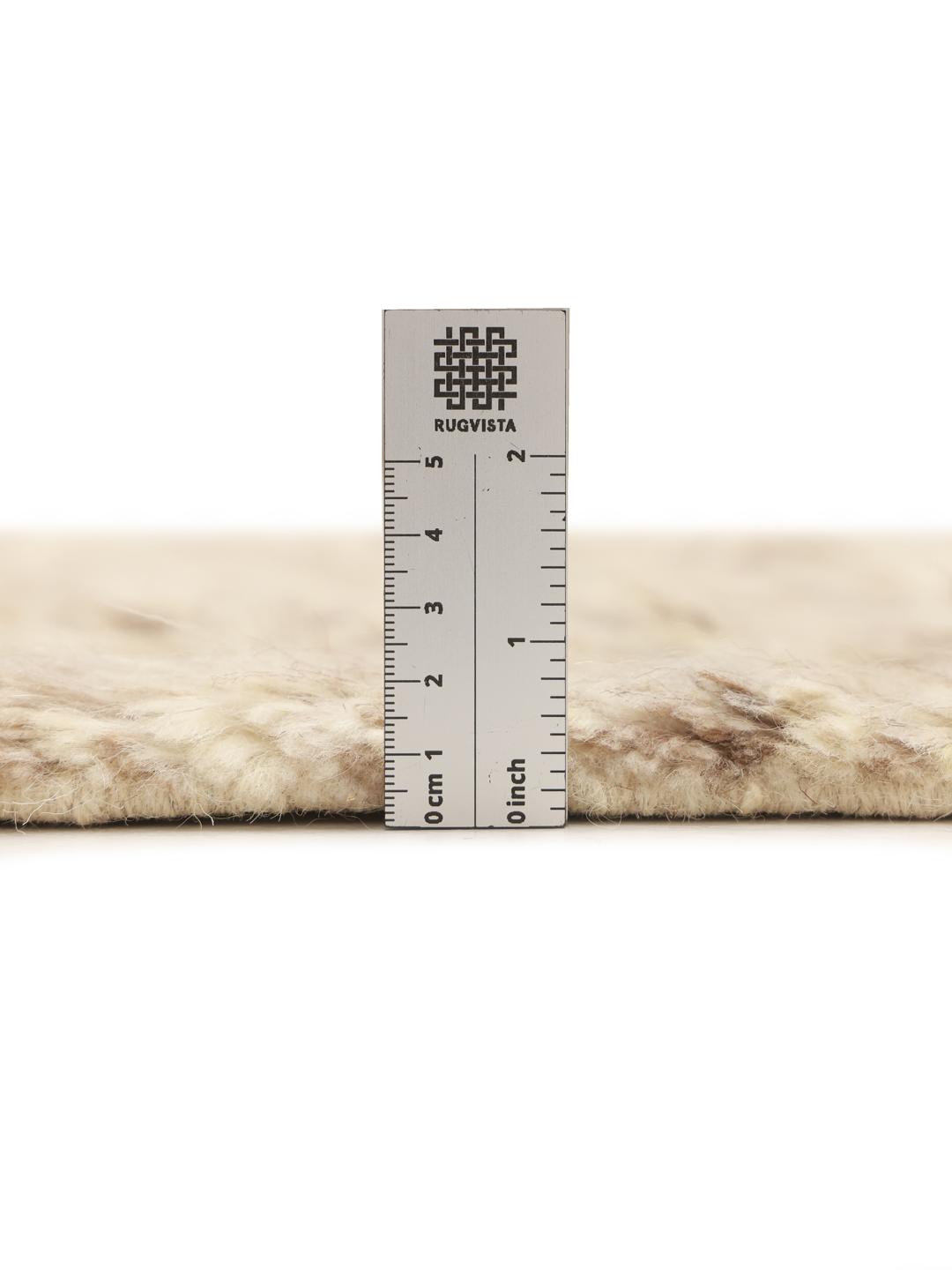 Hand-knotted Berber Style rug from the Middle East in a neutral beige tone