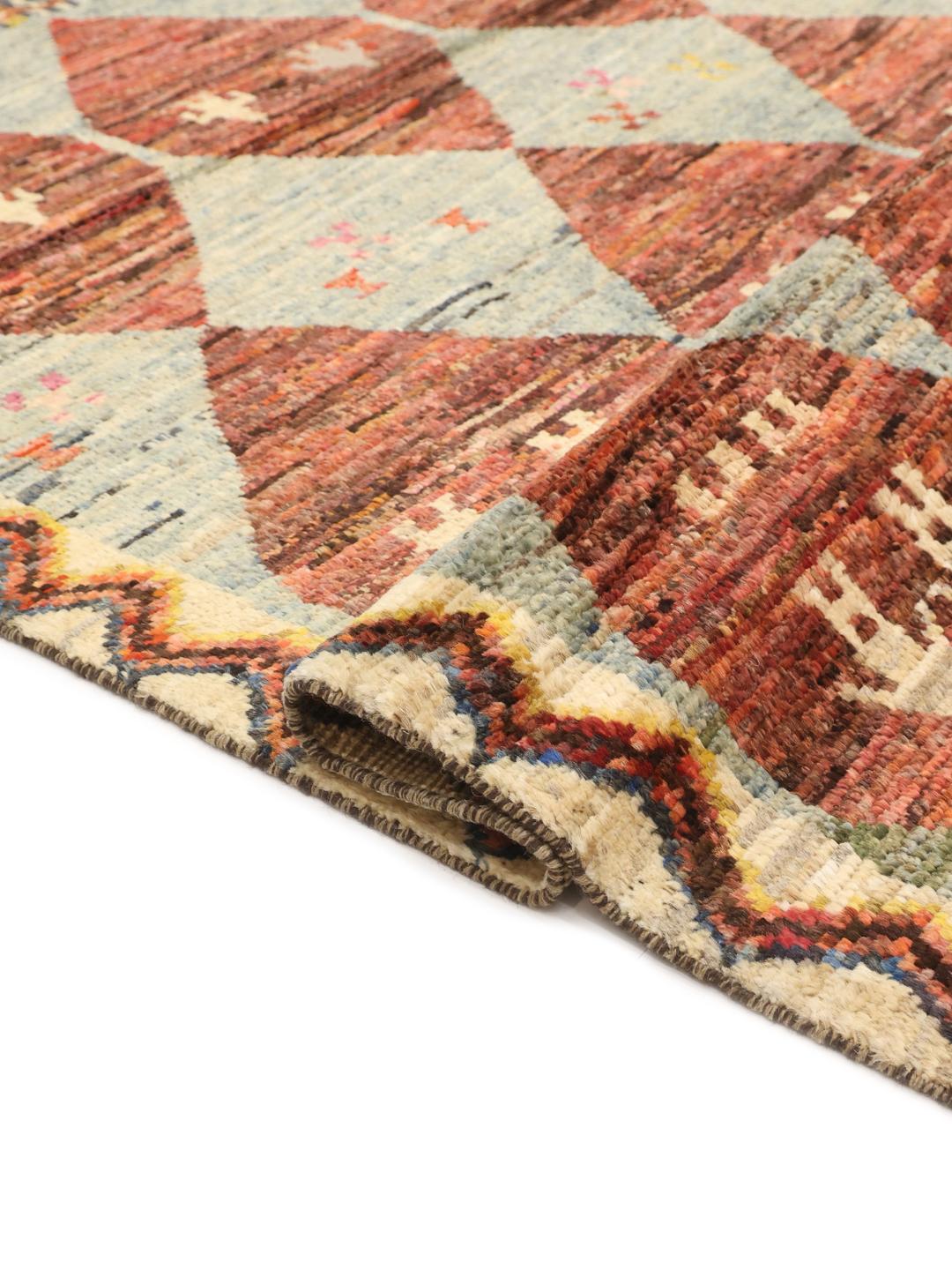 Hand-knotted Afghan rug with colourful diamond patterns and tribal motifs