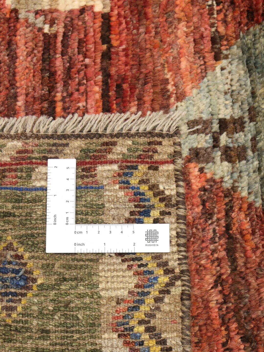 Hand-knotted Afghan rug with colourful diamond patterns and tribal motifs
