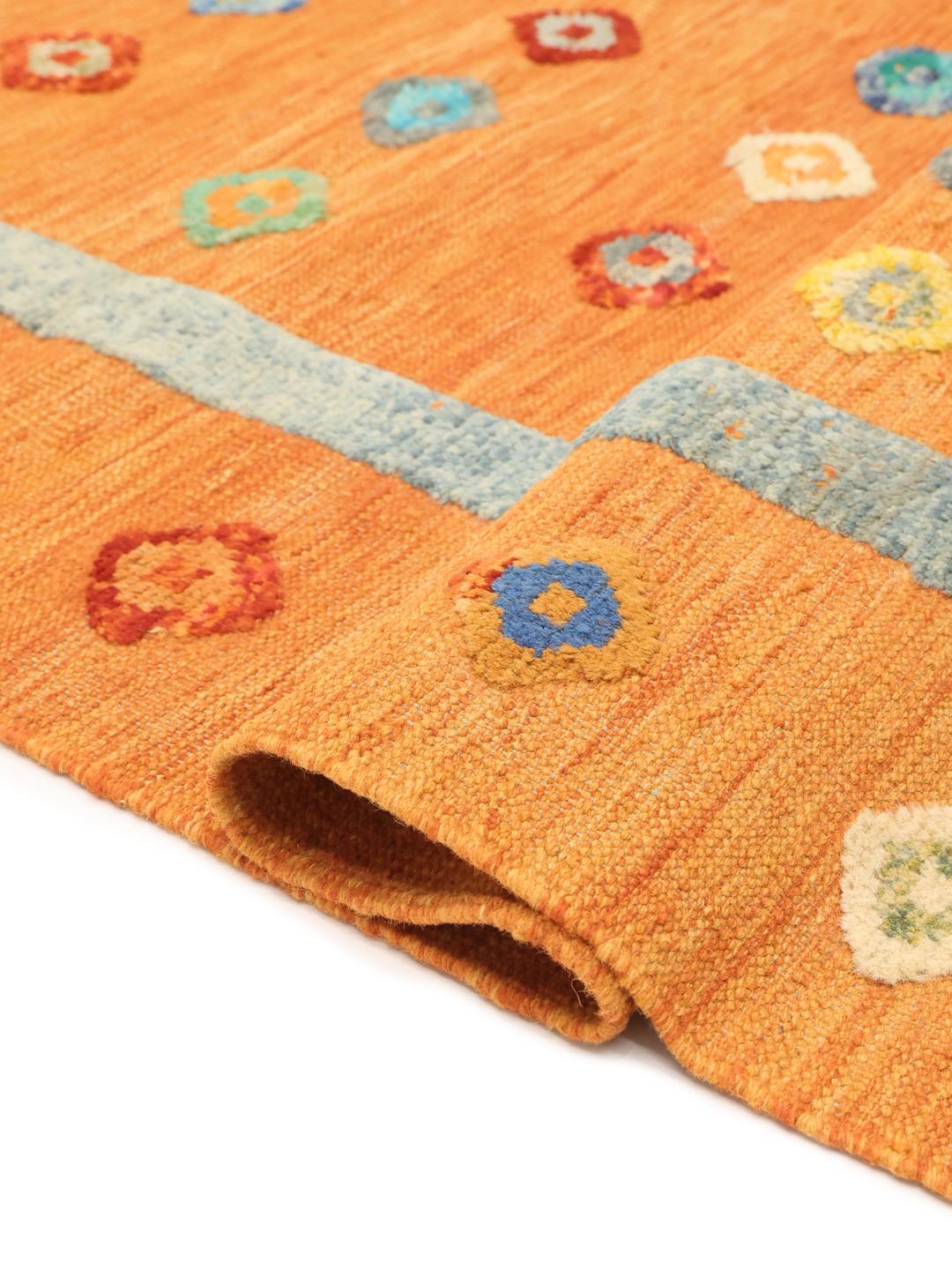 Hand-woven Afghan Kelim Nimbaft rug in vibrant orange with multi-coloured diamond patterns