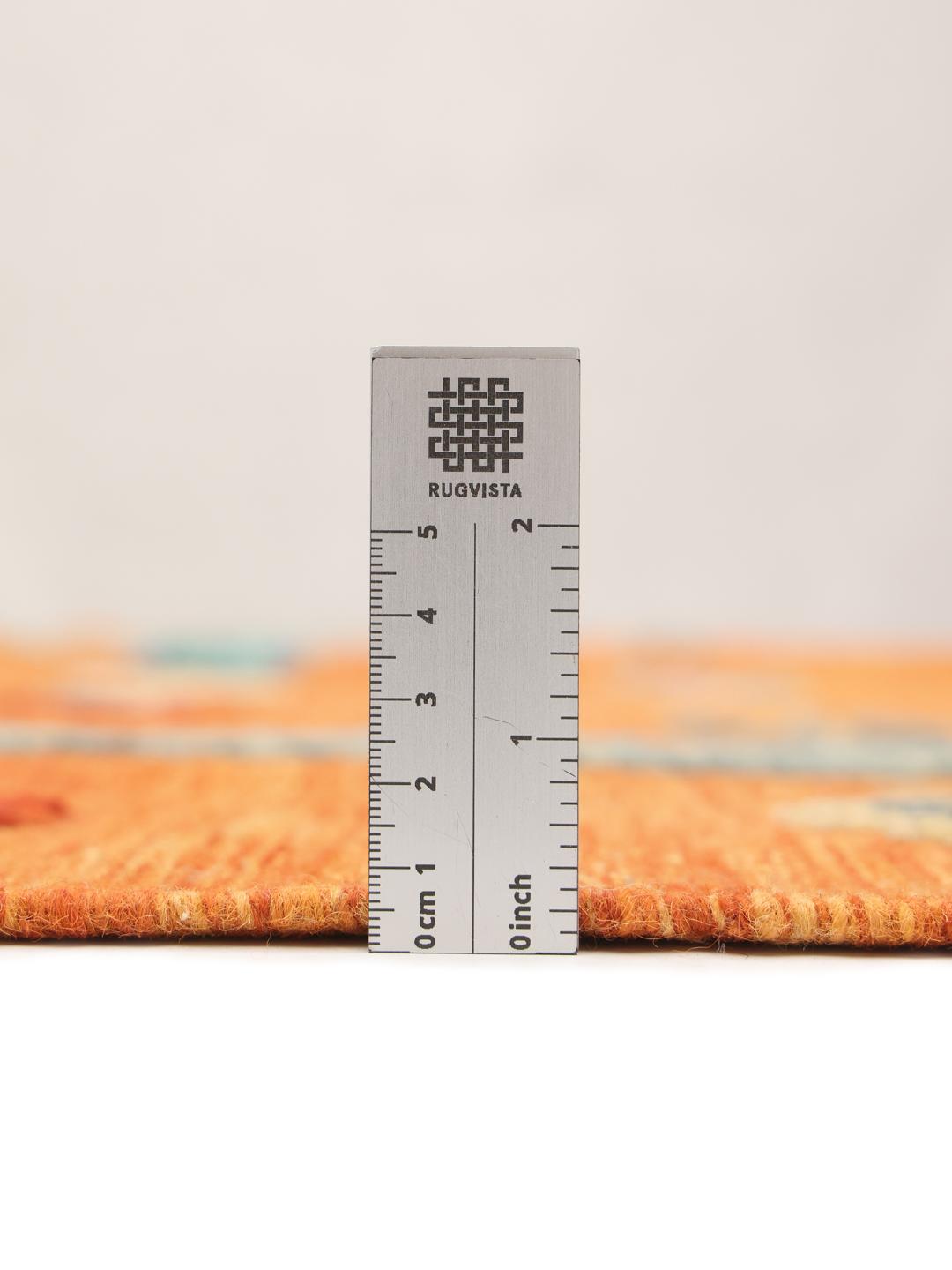 Hand-woven Afghan Kelim Nimbaft rug in vibrant orange with multi-coloured diamond patterns