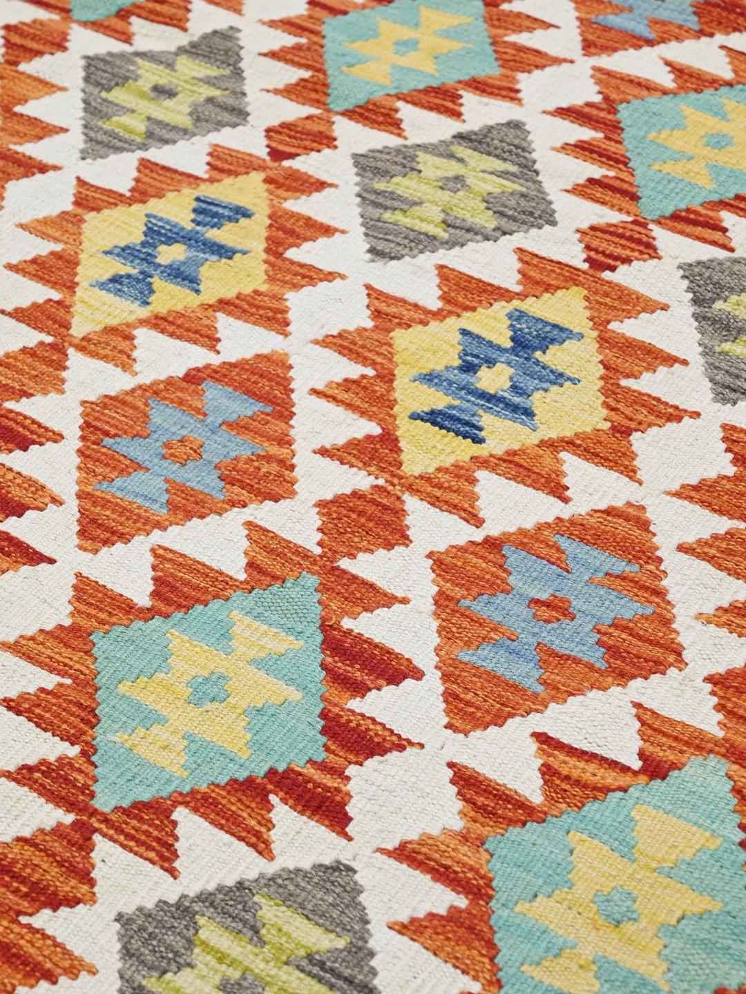 Handgeweven oranje Afghaans vloerkleed met geometrische patronen