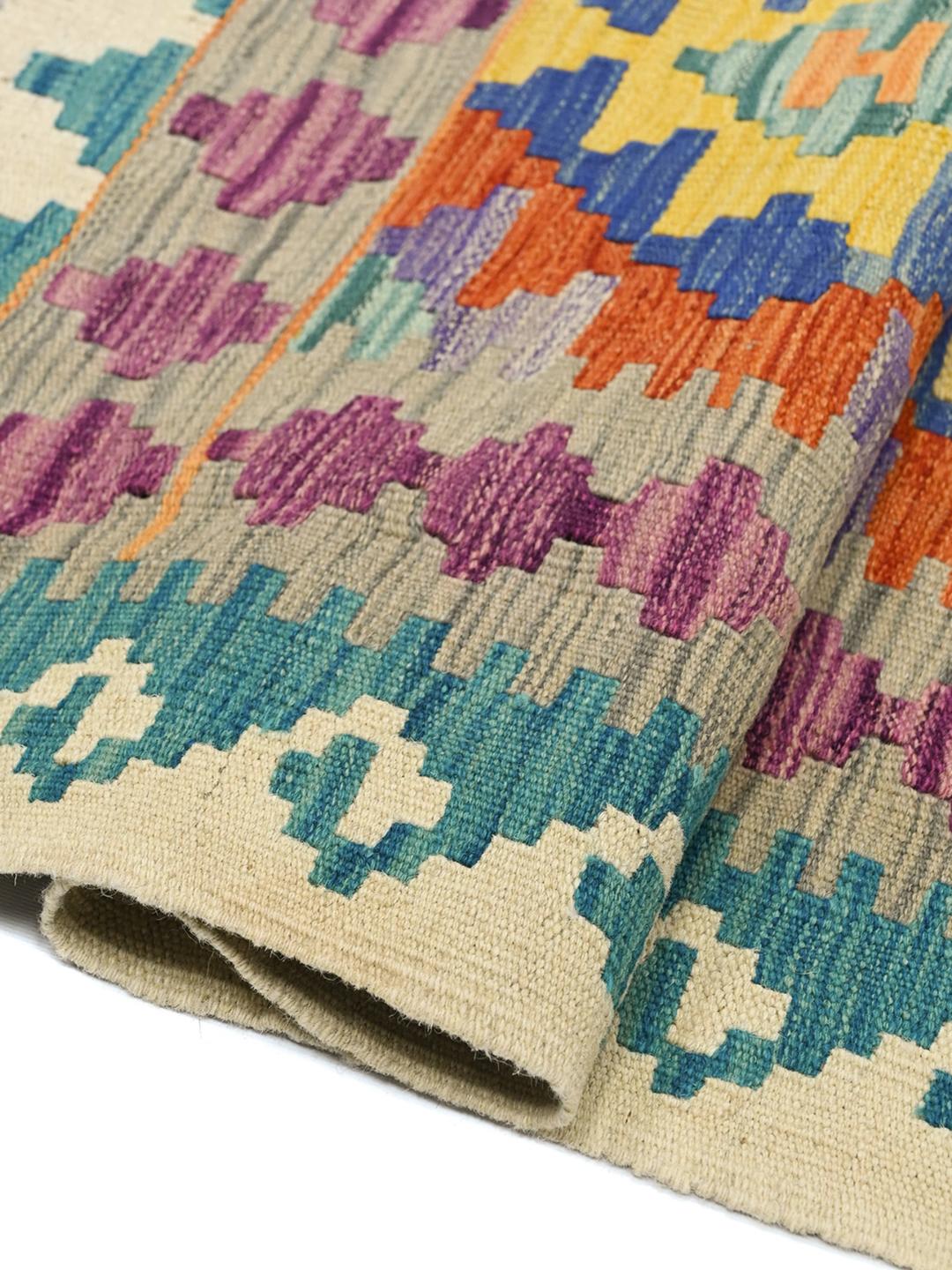 Hand-woven Afghan Kelim rug with vibrant geometric patterns in multicolor Wool