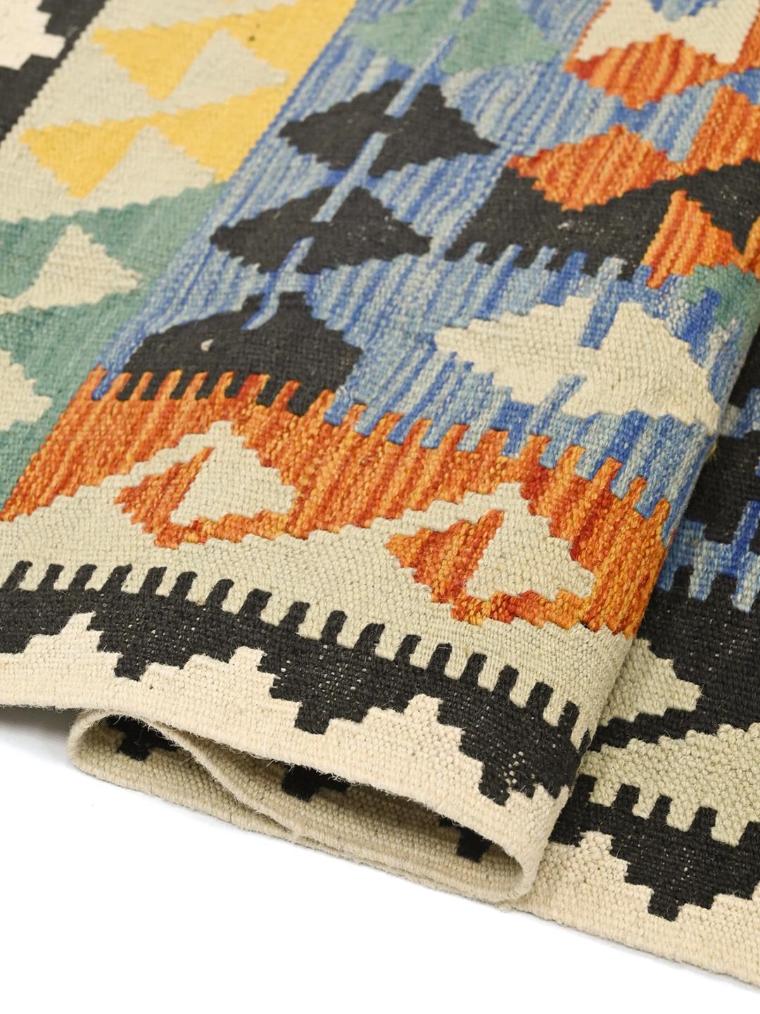 Tappeto Kelim afghano tessuto a mano con vivaci motivi geometrici in lana multicolore