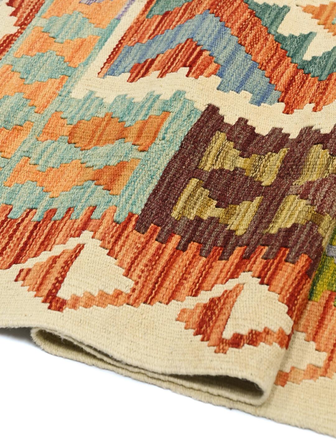 Hand-woven Afghan Kelim with vibrant geometric patterns in multicolor Wool