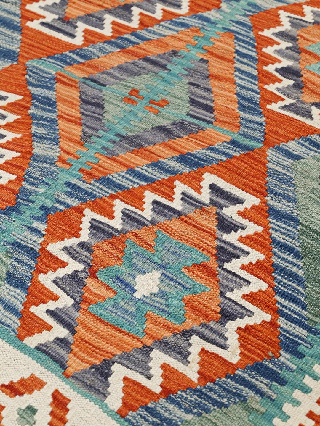 A hand-woven Kelim Afghan Old Style rug featuring vibrant geometric patterns and multicolor Wool.