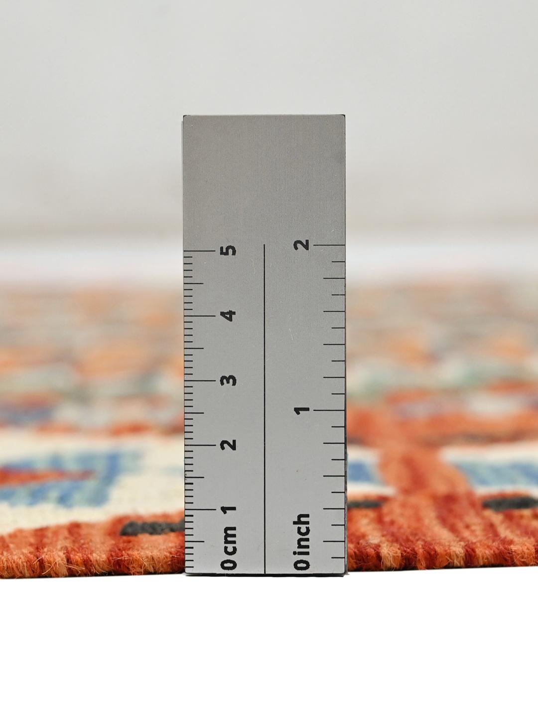 Hand-woven Afghan Kelim rug with geometric diamond patterns in orange and blue