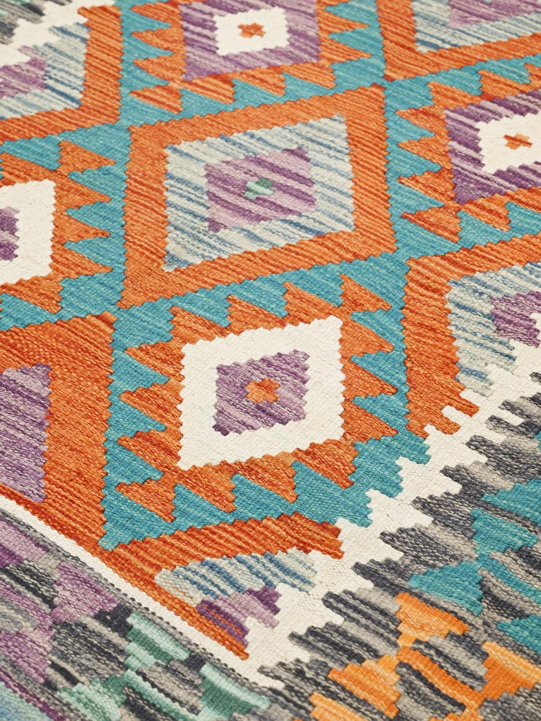 Hand-woven Afghan Kelim rug with vibrant multicolor geometric diamond patterns