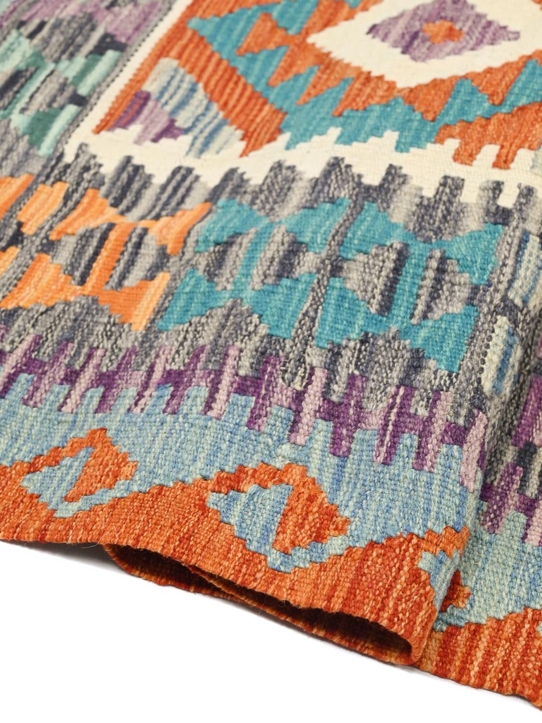 Hand-woven Afghan Kelim rug with vibrant multicolor geometric diamond patterns