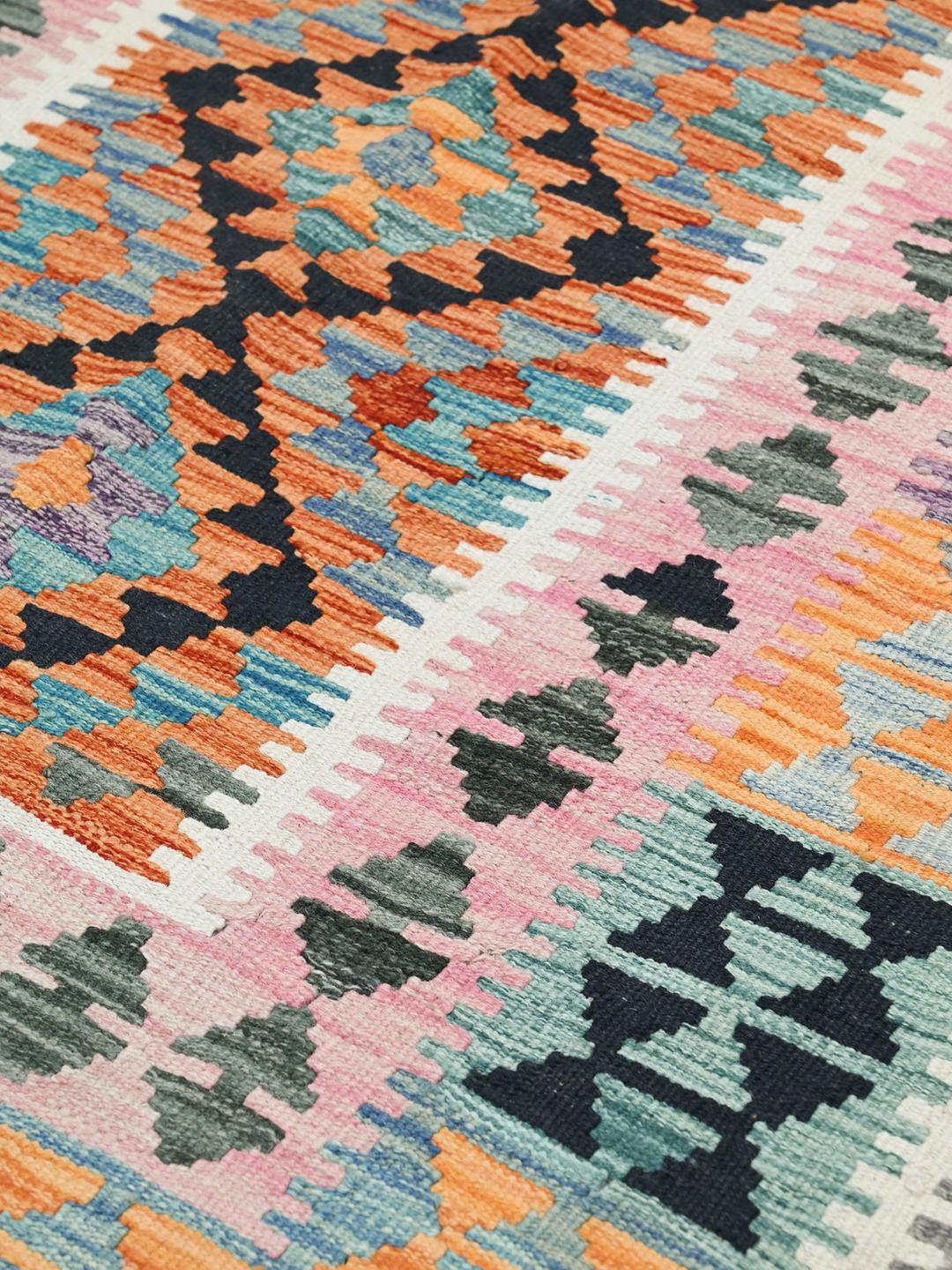 Hand-woven Afghan Kelim rug featuring geometric patterns in multicolour Wool.