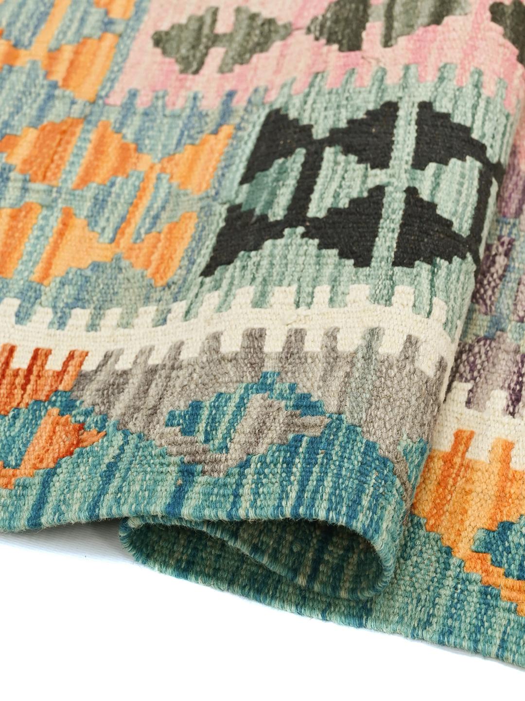Hand-woven Afghan Kelim rug featuring geometric patterns in multicolour Wool.