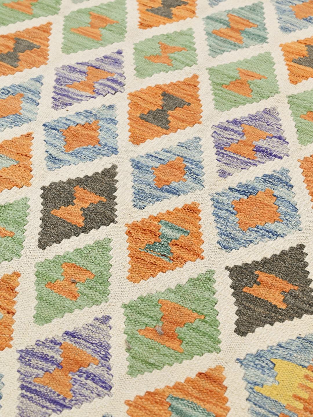 Hand-woven Afghan Kelim rug with a vibrant geometric diamond pattern in multicolor Wool