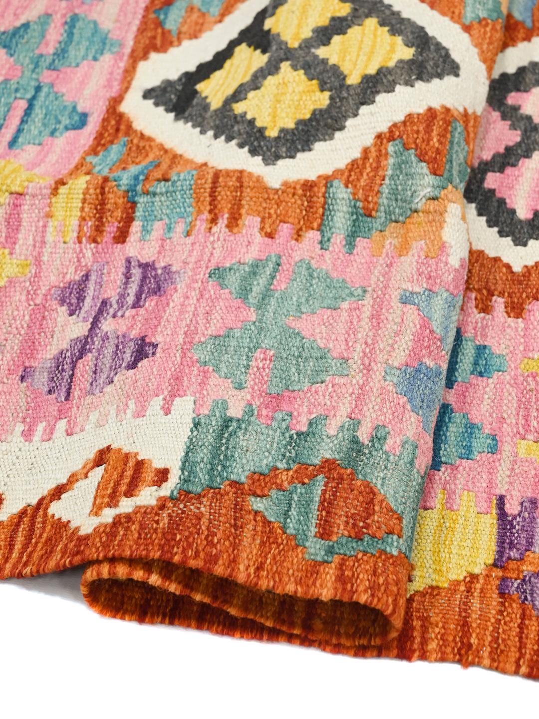 Hand-woven Afghan Kelim rug with a vibrant multicolor geometric diamond pattern