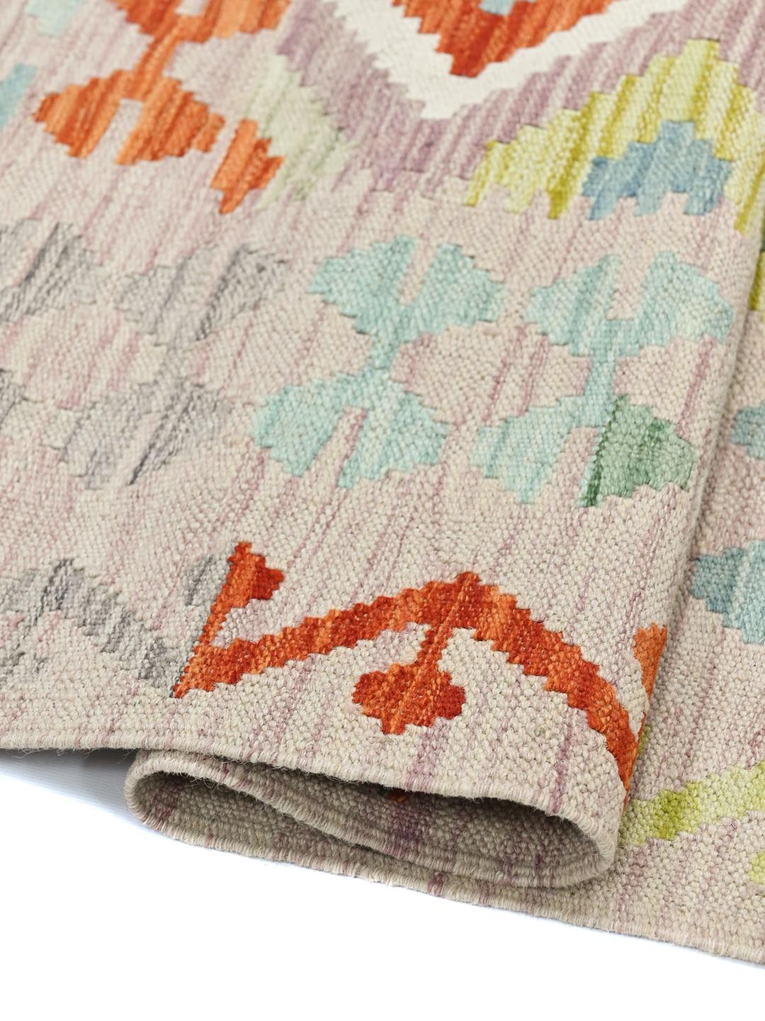 Hand-woven Afghan Kelim rug with a colourful diamond pattern