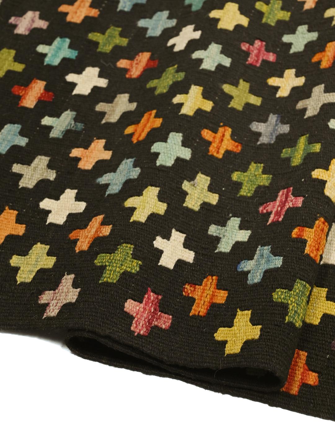 Hand-woven Afghan Kelim rug with a black field and colourful cross motifs