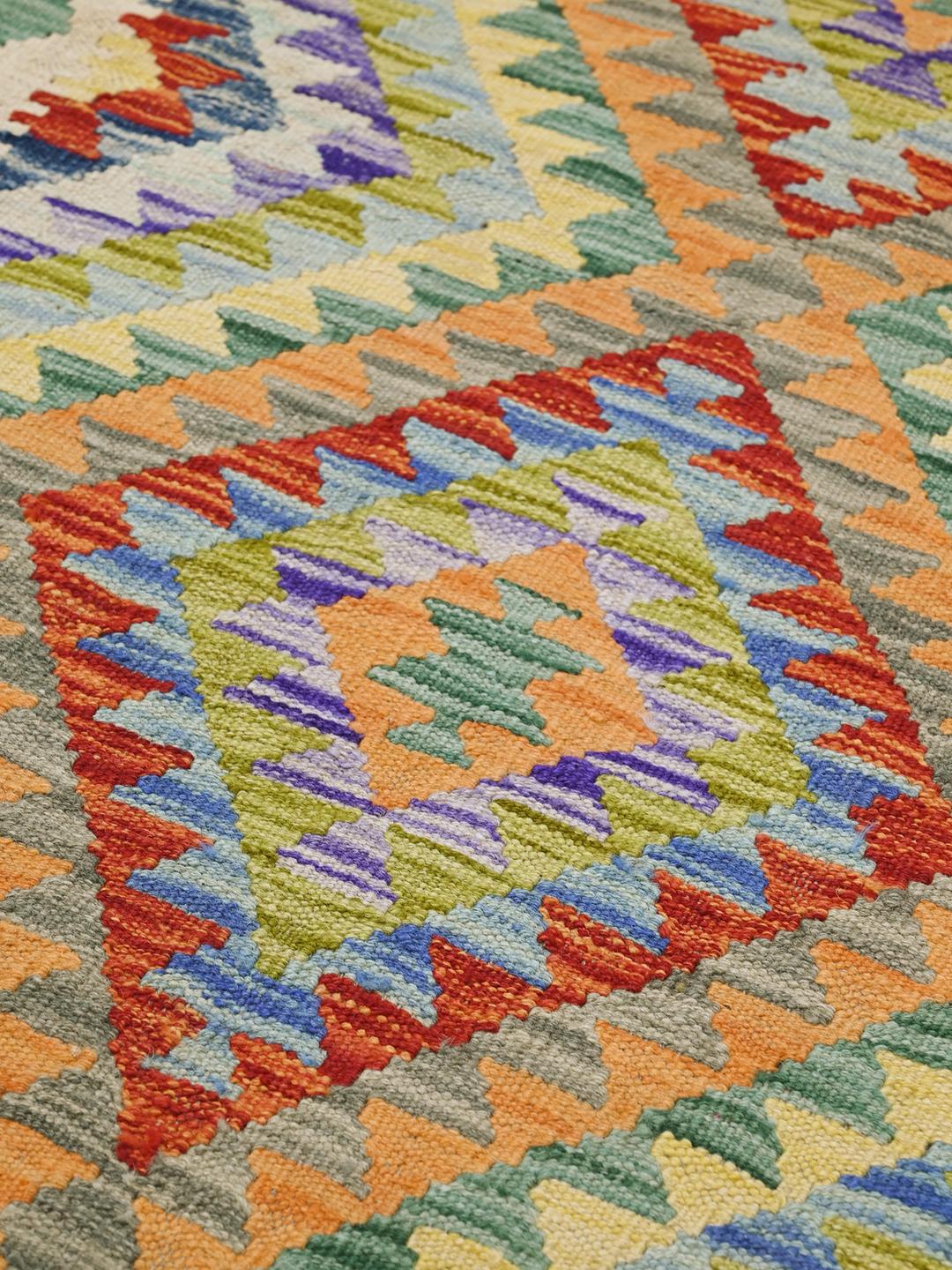 Hand-woven Afghan Kelim rug in multicolor wool