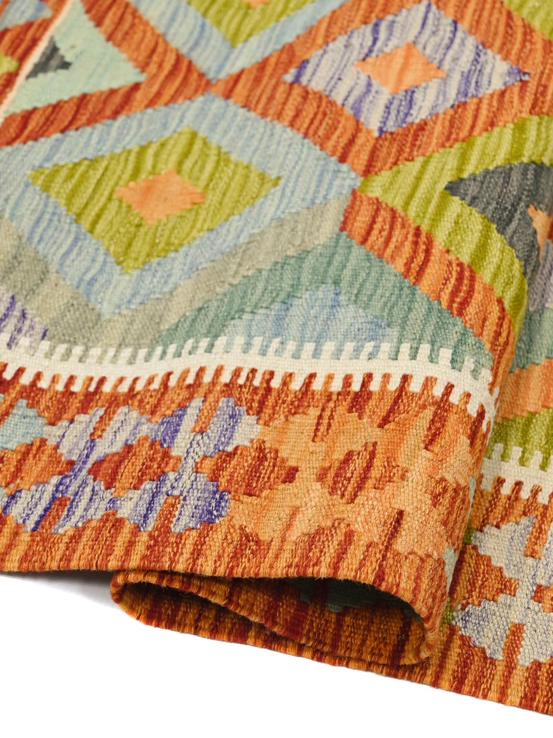 Hand-woven Kelim Afghan Old Style rug in orange and blue with geometric diamond patterns