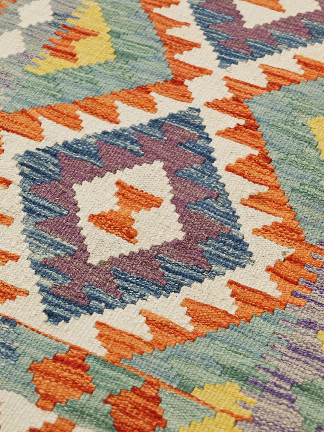 Hand-woven Kelim Afghan rug in multicolor wool with tribal diamond patterns