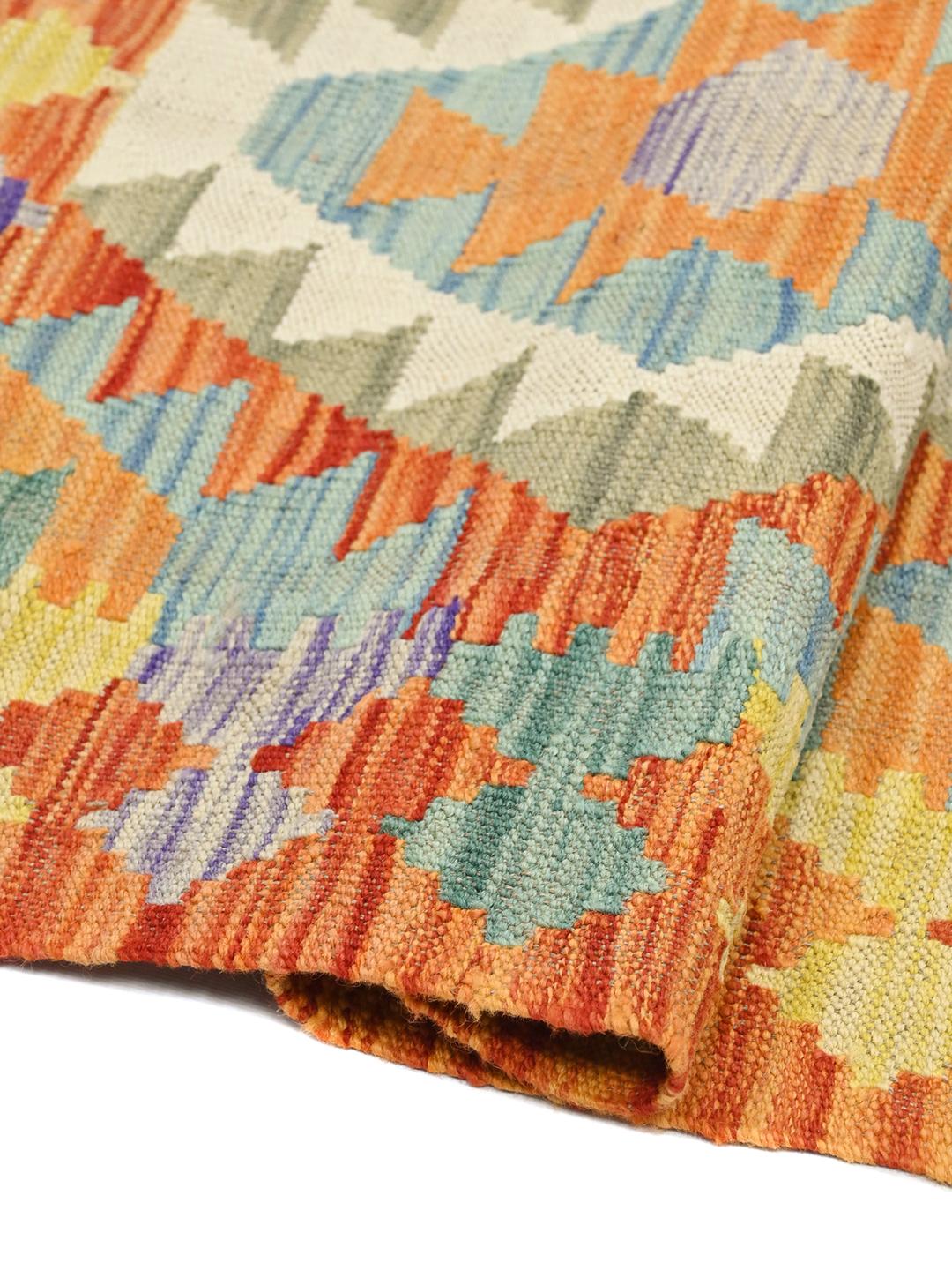 Hand-woven Kelim Afghan runner in orange and multicolor with tribal diamond patterns