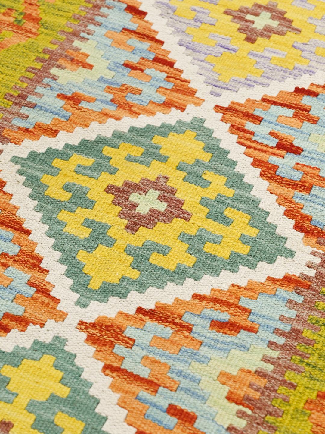 Hand-woven Afghan runner with a vibrant multicolour geometric pattern