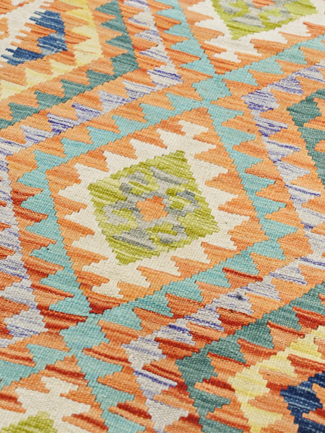Hand-woven Afghan Kelim runner with geometric patterns in multicolour