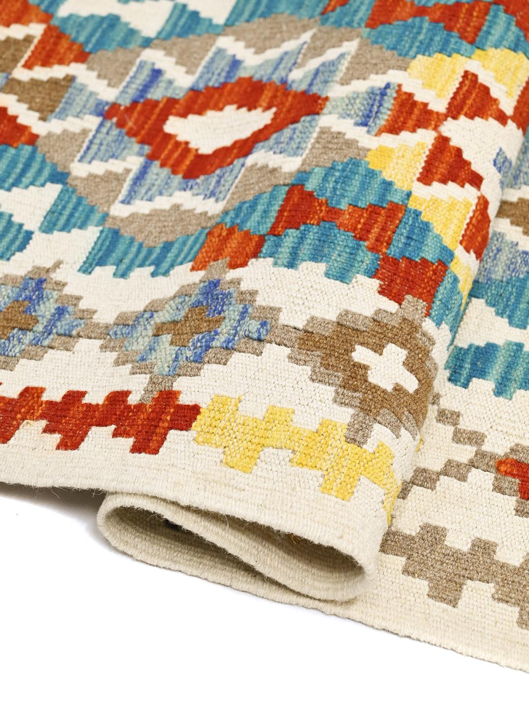 Handgeweven Afghaanse loper met levendige geometrische patronen in veelkleurige wol