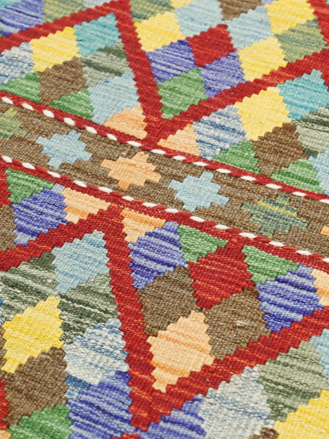 Runner Kelim afghano tessuto a mano con un colorato motivo a rombi
