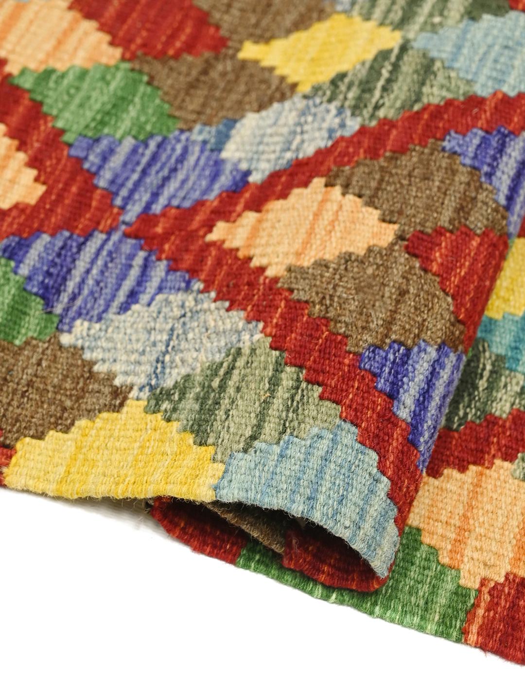 Runner Kelim afghano tessuto a mano con un colorato motivo a rombi