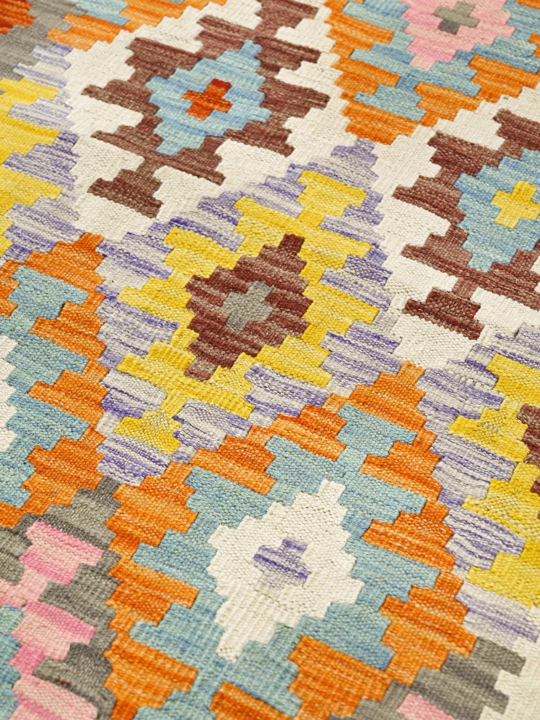 Hand-woven Afghan runner rug with vibrant geometric patterns in multicoloured Wool
