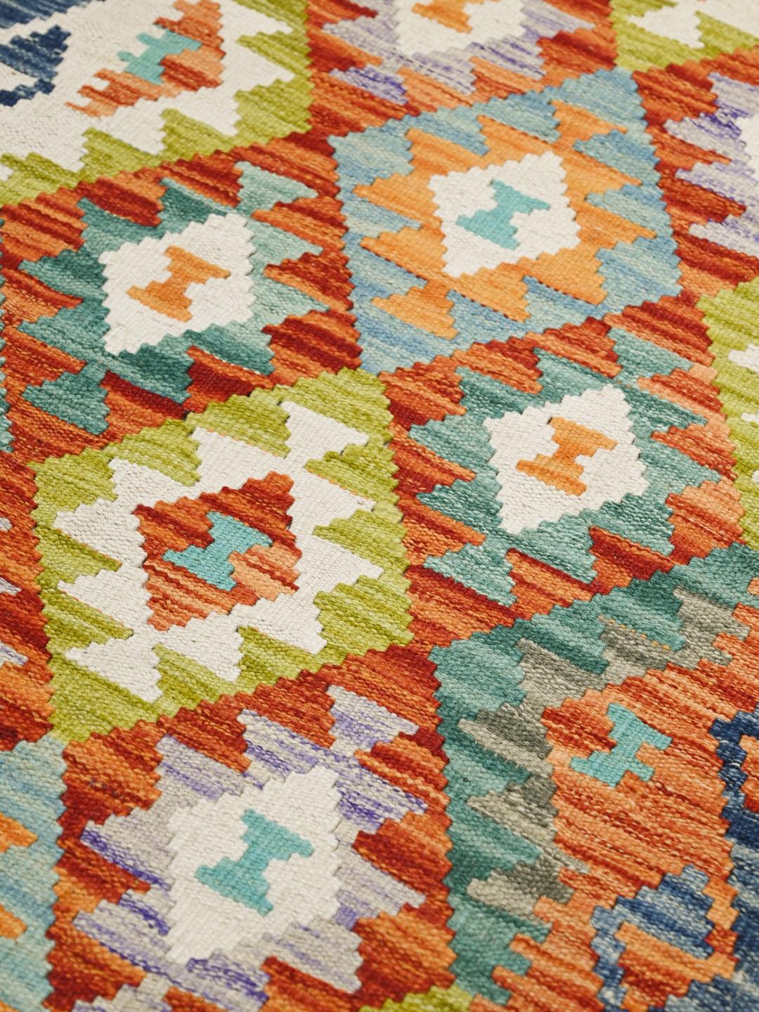 Hand-woven Afghan runner with a vibrant multicolor geometric pattern